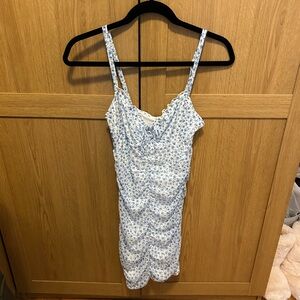 White and blue floral ruched mini dress. Size S, fits XS-M